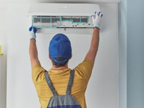HVAC technician completing HVAC installation in Kansas City